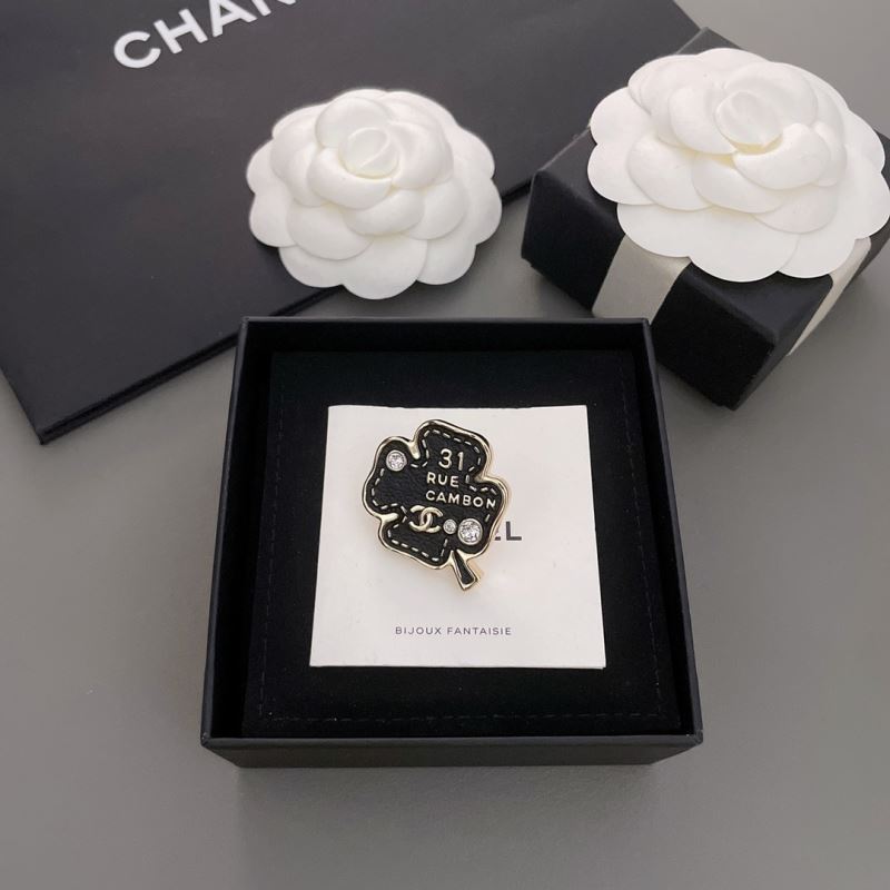 Ch*el brooches